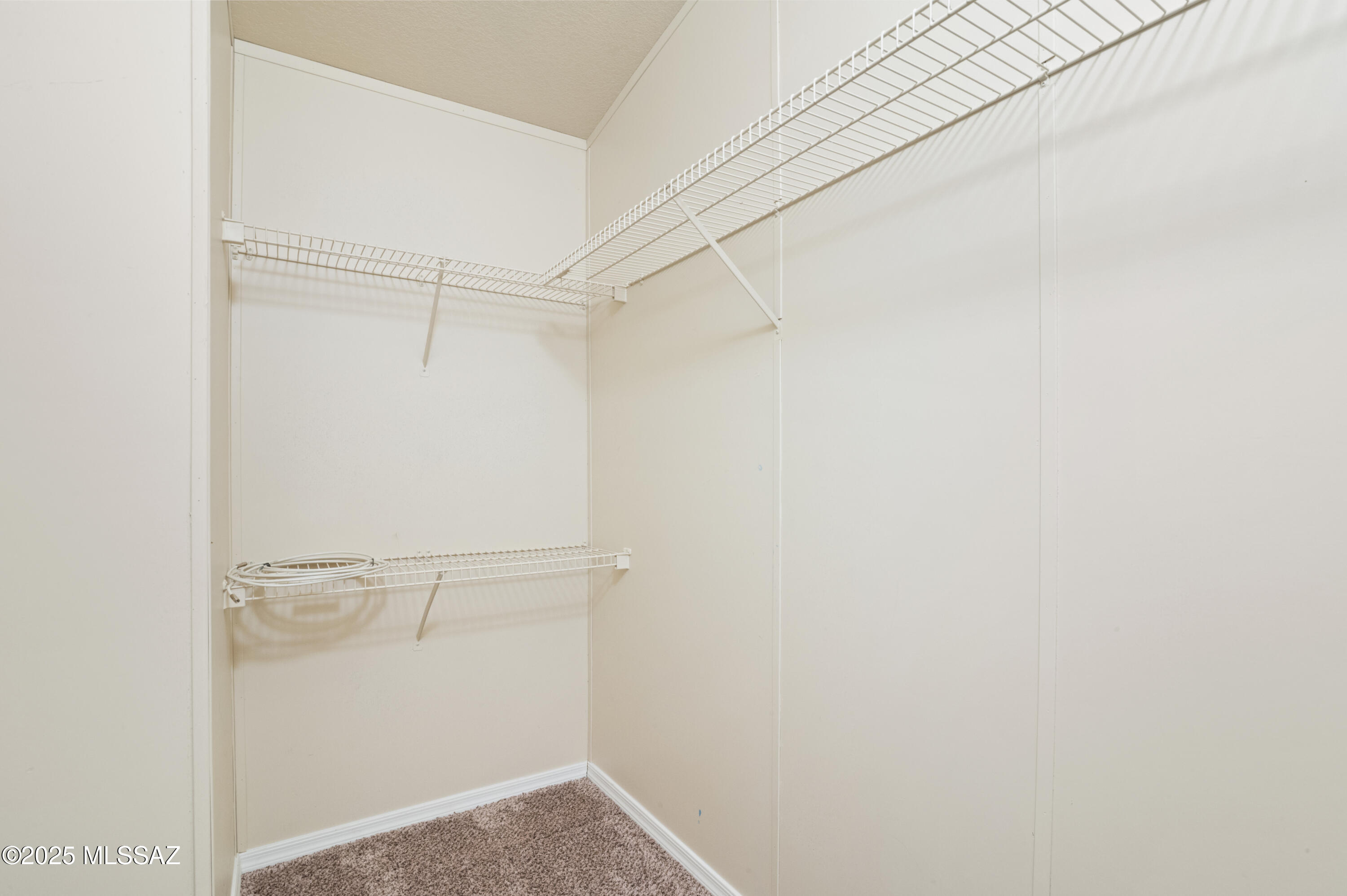 6205 East Rough Rock Drive Tucson, AZ 85756 - Photo 11 of 30 a view of an empty walk in closet