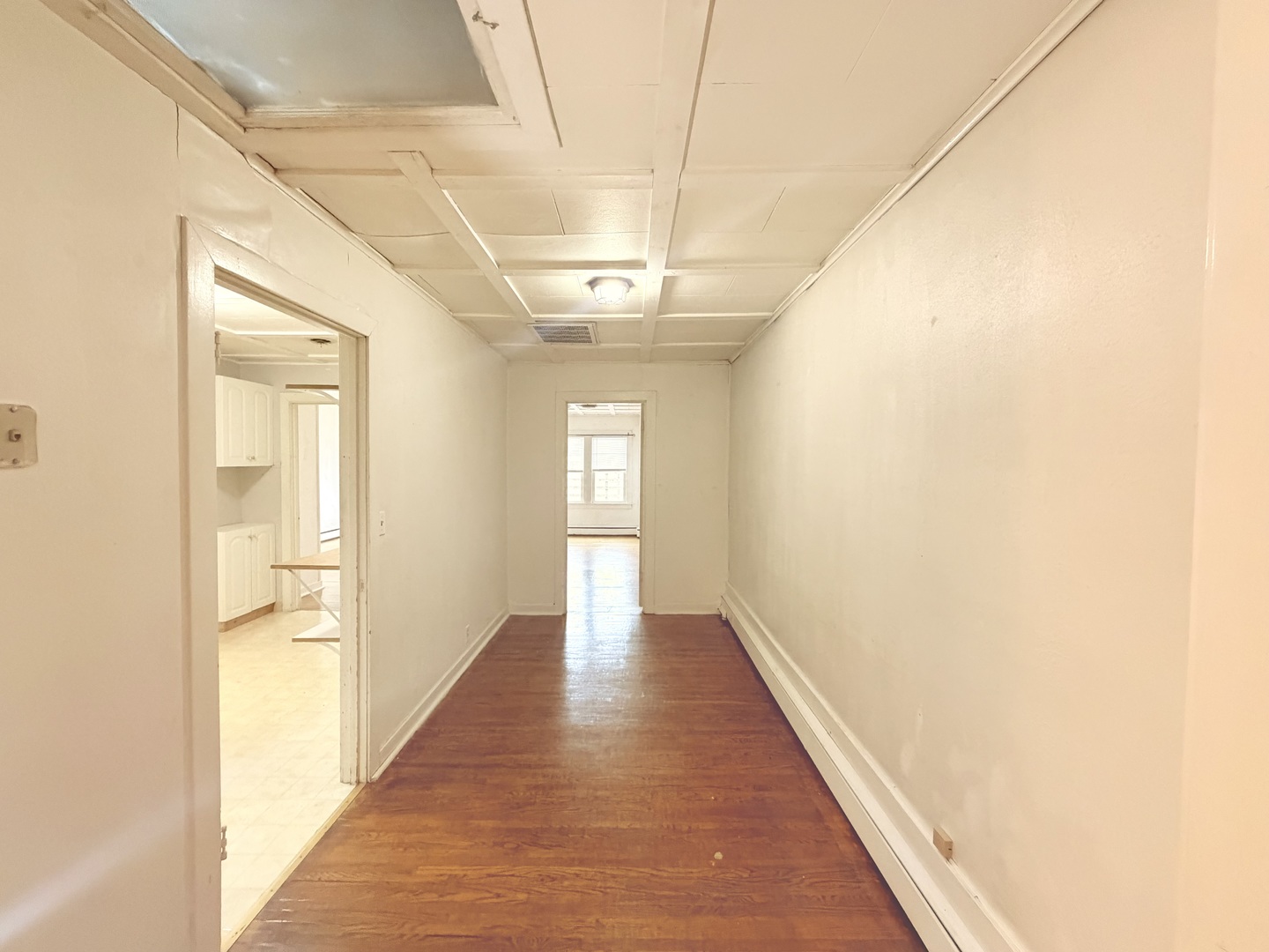 134 West State Street Sycamore, IL 60178 - Photo 33 of 43 a view of a hallway with wooden floor