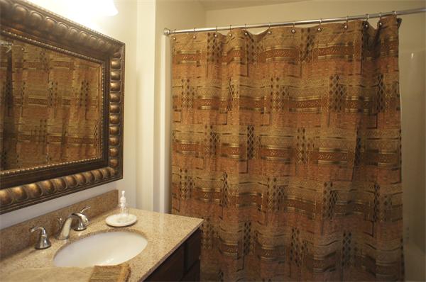 8 Collins Road North Brookfield, MA 01535 - Photo 13 of 27 a bathroom with a sink and a mirror