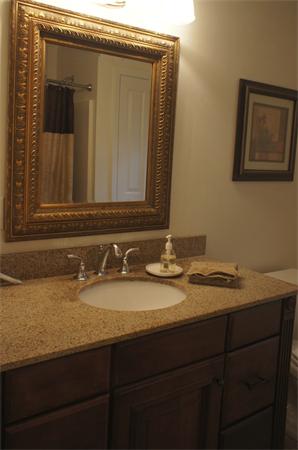 8 Collins Road North Brookfield, MA 01535 - Photo 15 of 27 a bathroom with a granite countertop sink and a mirror