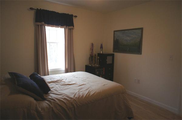 8 Collins Road North Brookfield, MA 01535 - Photo 16 of 27 a bedroom with a bed and a window