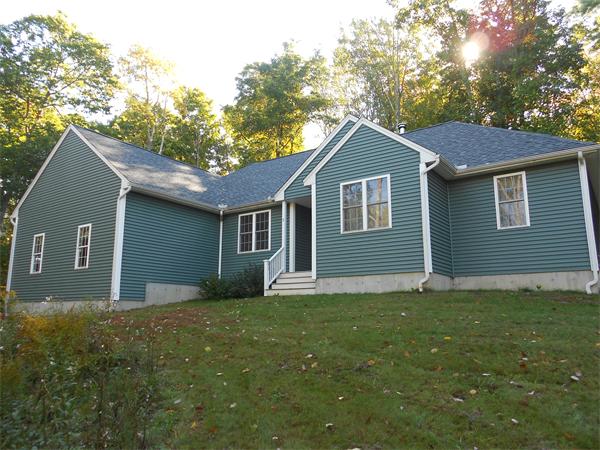 8 Collins Road North Brookfield, MA 01535 - Photo 2 of 27 a house with garden