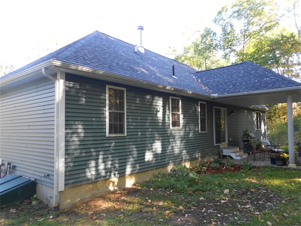 8 Collins Road North Brookfield, MA 01535 - Photo 24 of 27 a front view of a house with garden