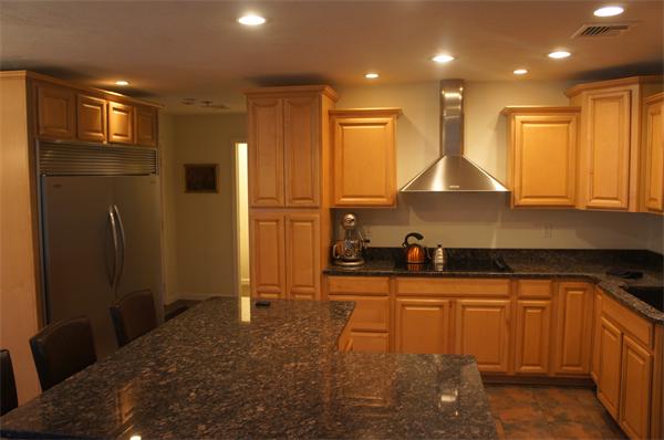 8 Collins Road North Brookfield, MA 01535 - Photo 4 of 27 a kitchen with stainless steel appliances granite countertop a refrigerator a sink and a stove