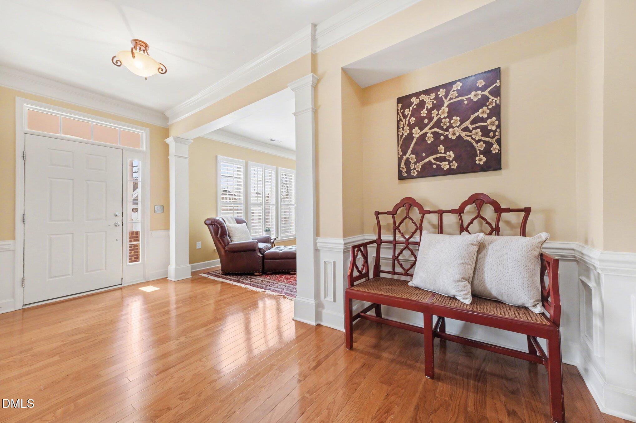 281 Beckingham Loop Cary, NC 27519 - Photo 10 of 56 a living room with furniture and a wooden floor