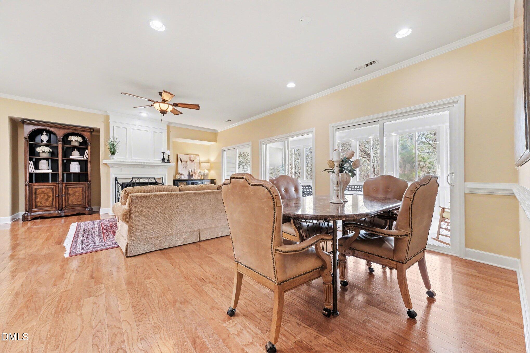 281 Beckingham Loop Cary, NC 27519 - Photo 19 of 56 a living room with furniture and wooden floor