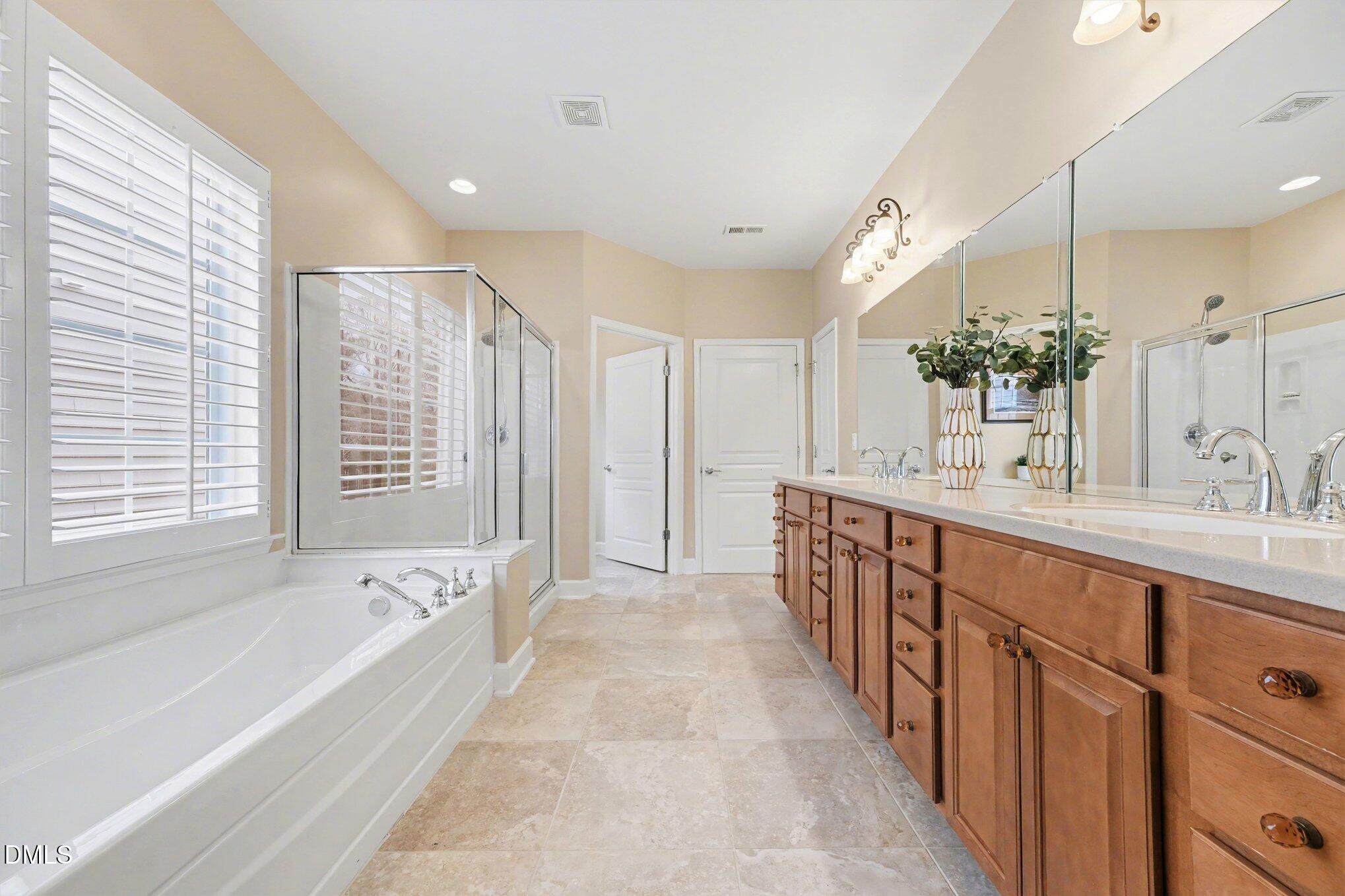 281 Beckingham Loop Cary, NC 27519 - Photo 21 of 56 a spacious bathroom with sink shower and bathtub