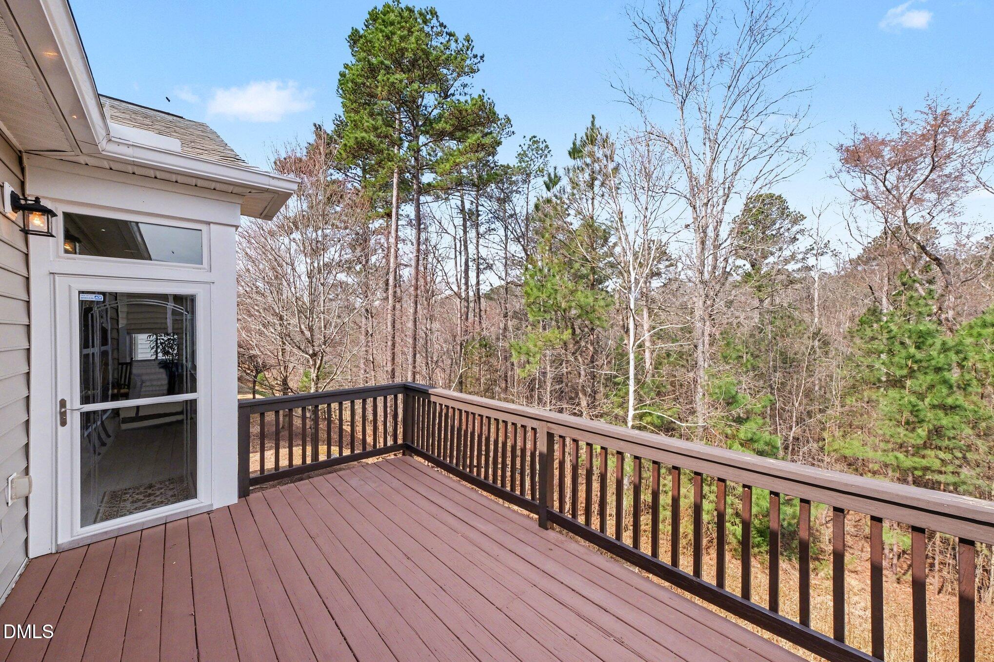 281 Beckingham Loop Cary, NC 27519 - Photo 31 of 56 a view of a balcony with wooden floor