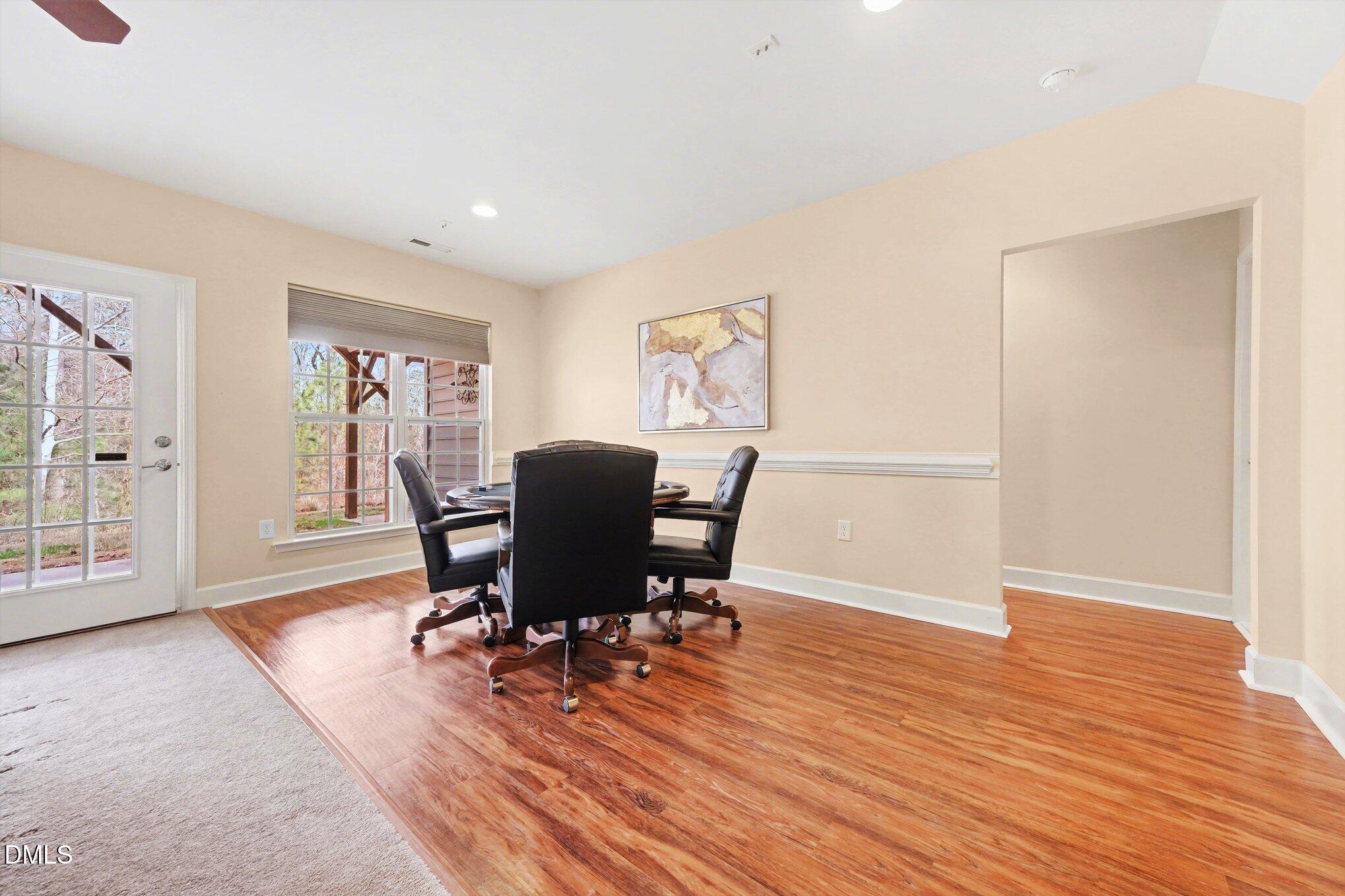 281 Beckingham Loop Cary, NC 27519 - Photo 38 of 56 a view of a workspace with furniture and wooden floor