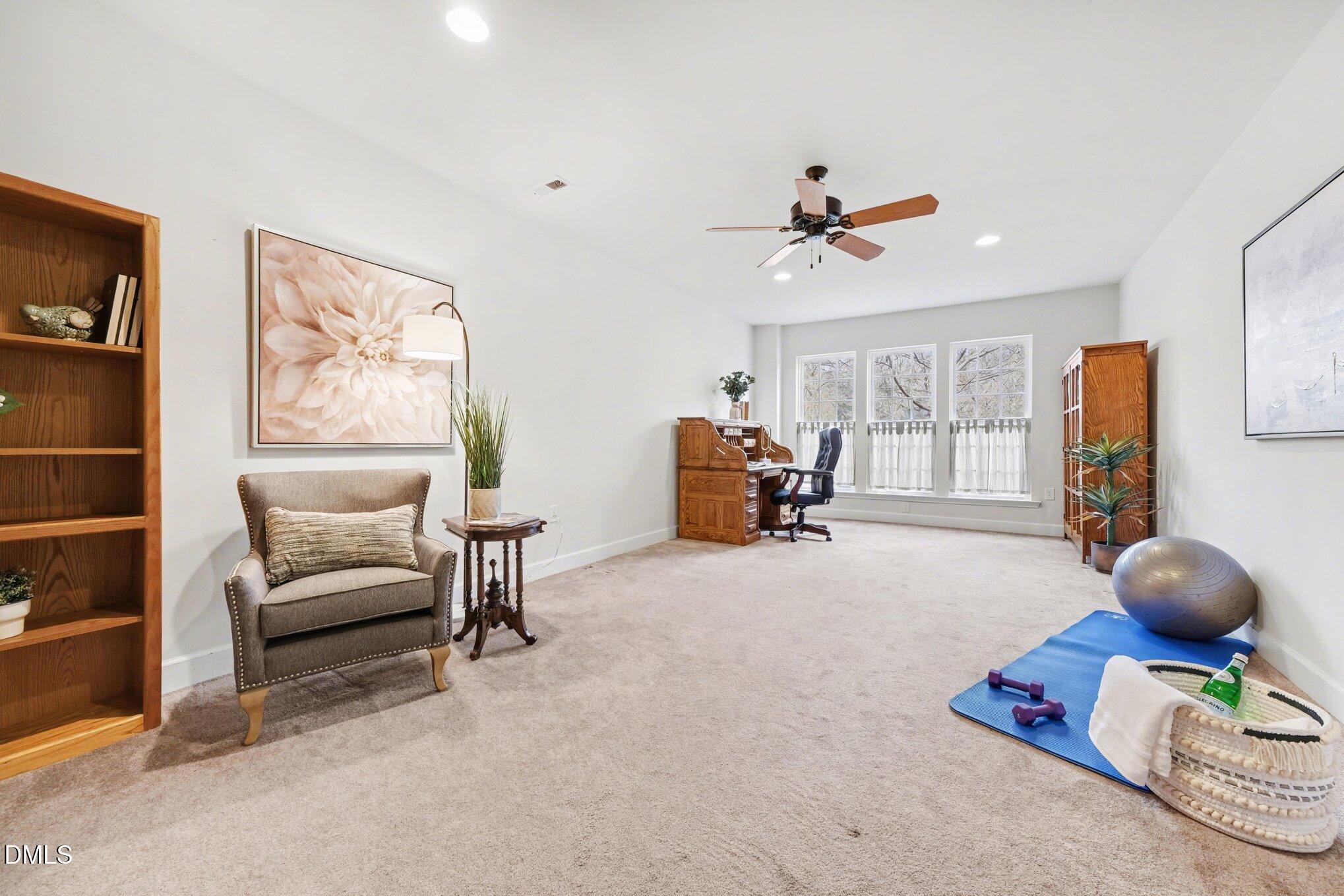 281 Beckingham Loop Cary, NC 27519 - Photo 41 of 56 a living room with furniture and a large window