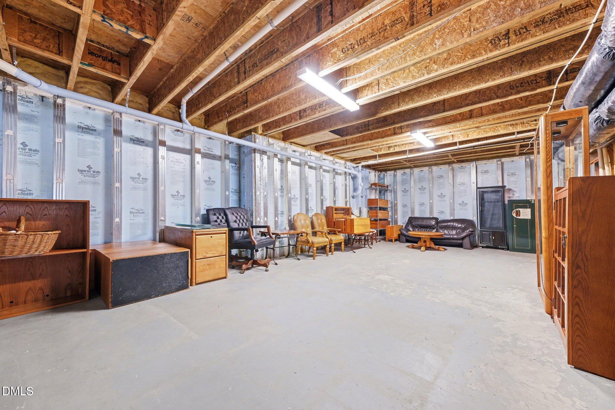 281 Beckingham Loop Cary, NC 27519 - Photo 43 of 56 a view of a storage room with furniture and a garage