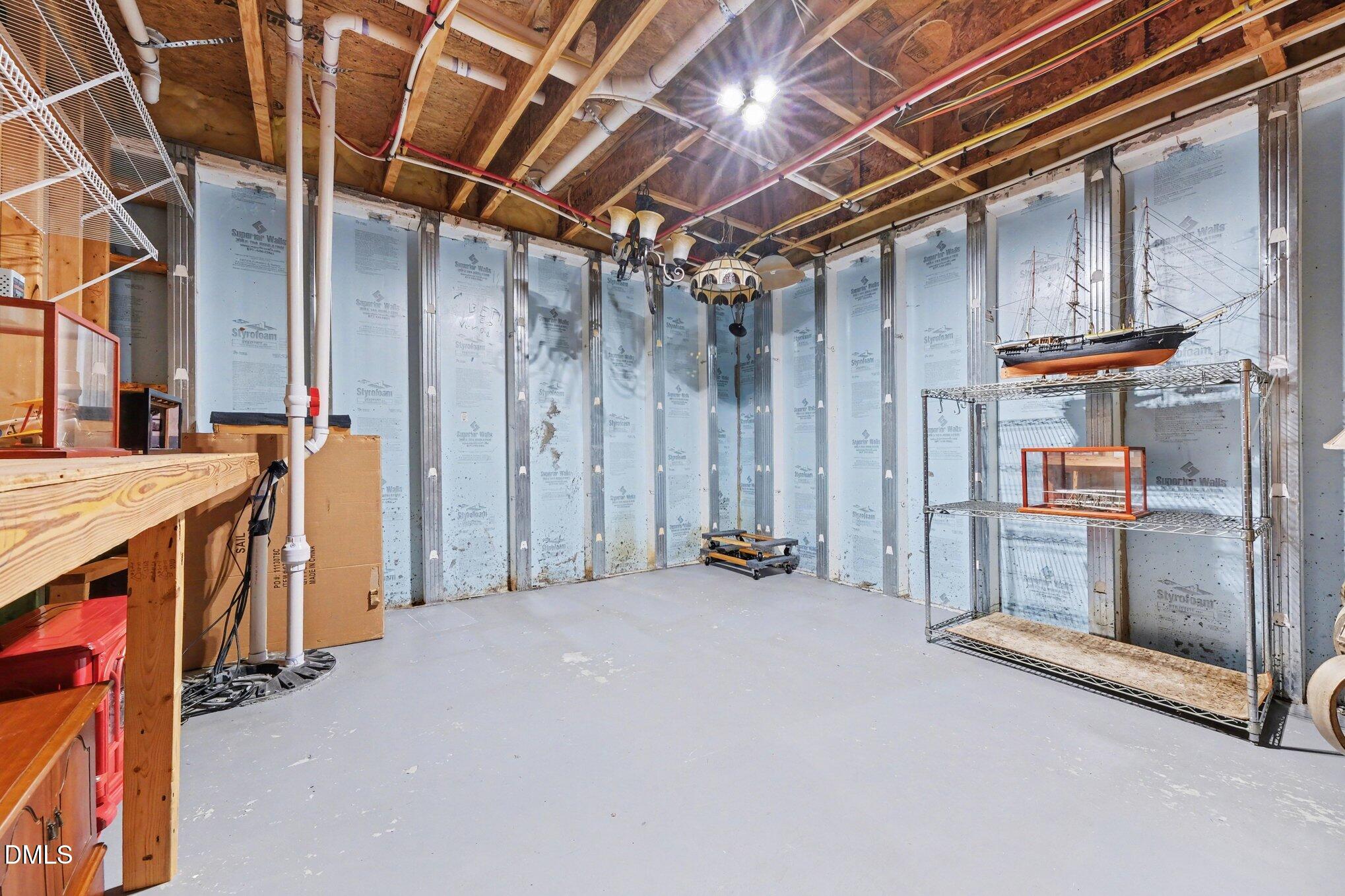 281 Beckingham Loop Cary, NC 27519 - Photo 44 of 56 a view of an empty room with a fridge