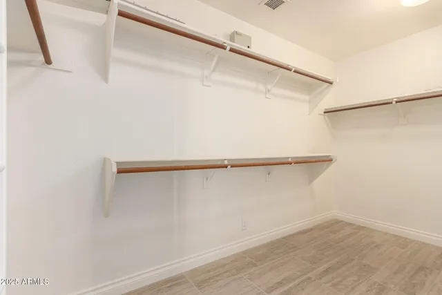 a view of a room with racks on the wall