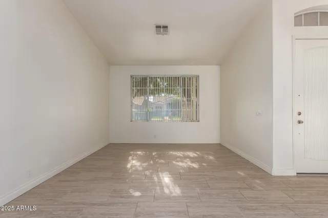 an empty room with windows