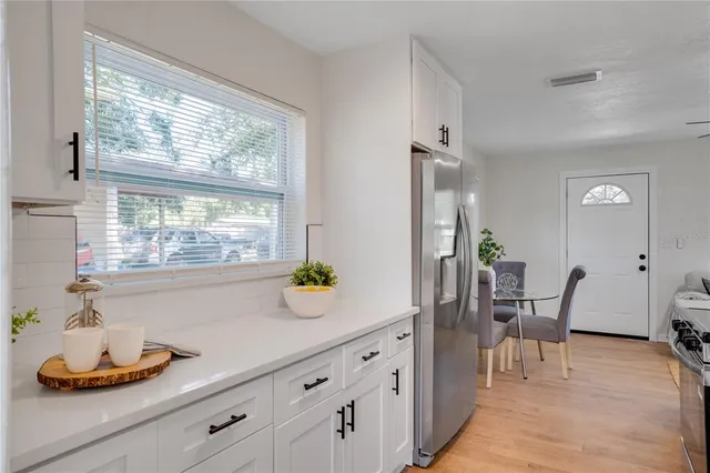 a living room with furniture and window