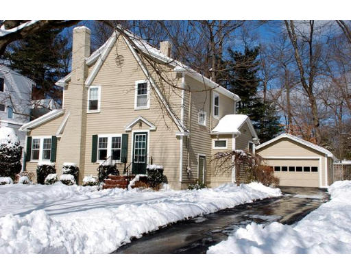 63 Moffat Road Newton, MA 02468 - Photo 1 of 7 a view of a white house with large trees and outdoor space