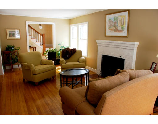 63 Moffat Road Newton, MA 02468 - Photo 3 of 7 a living room with furniture and a fireplace