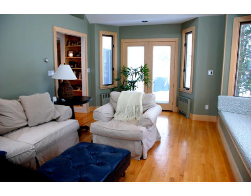 63 Moffat Road Newton, MA 02468 - Photo 4 of 7 a living room with furniture and a fireplace