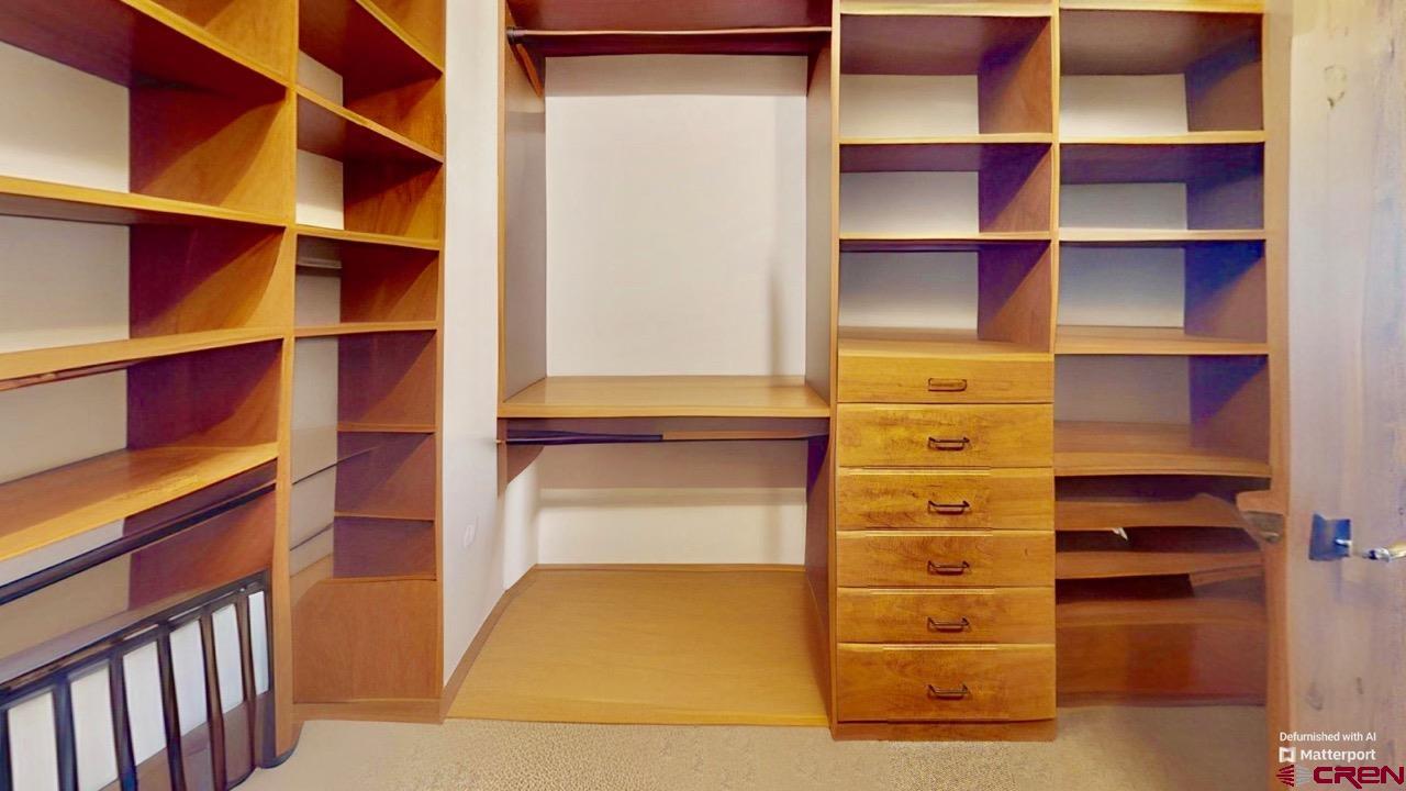 14 Hunter Hill Road, Unit A405 Crested Butte, CO 81225 - Photo 17 of 38 a view of walk in closet with empty racks
