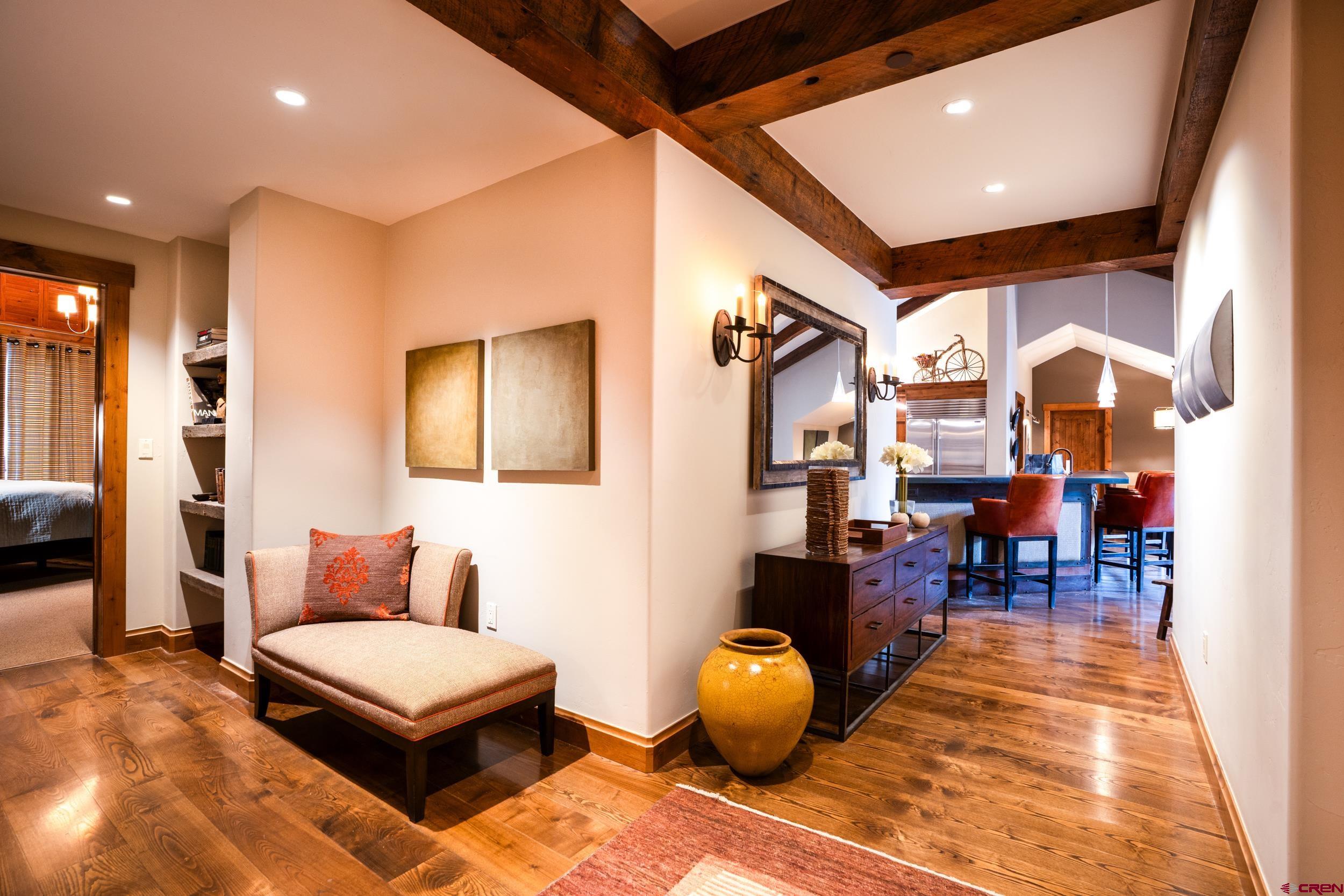 14 Hunter Hill Road, Unit A405 Crested Butte, CO 81225 - Photo 23 of 38 a living room with furniture and a potted plant