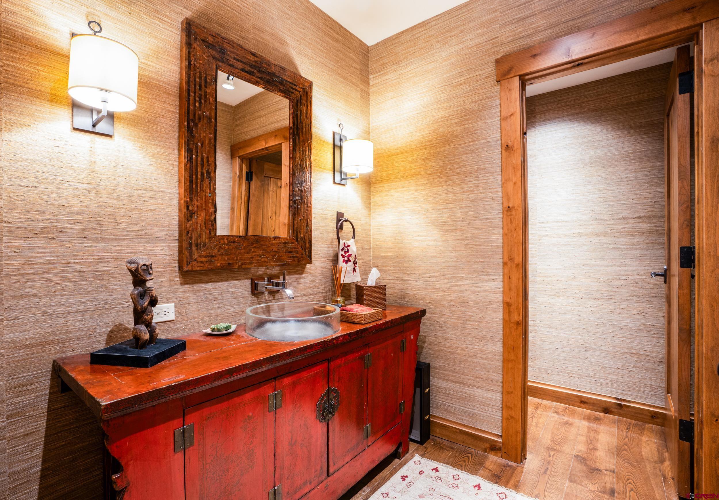 14 Hunter Hill Road, Unit A405 Crested Butte, CO 81225 - Photo 24 of 38 a bathroom with a sink and a mirror