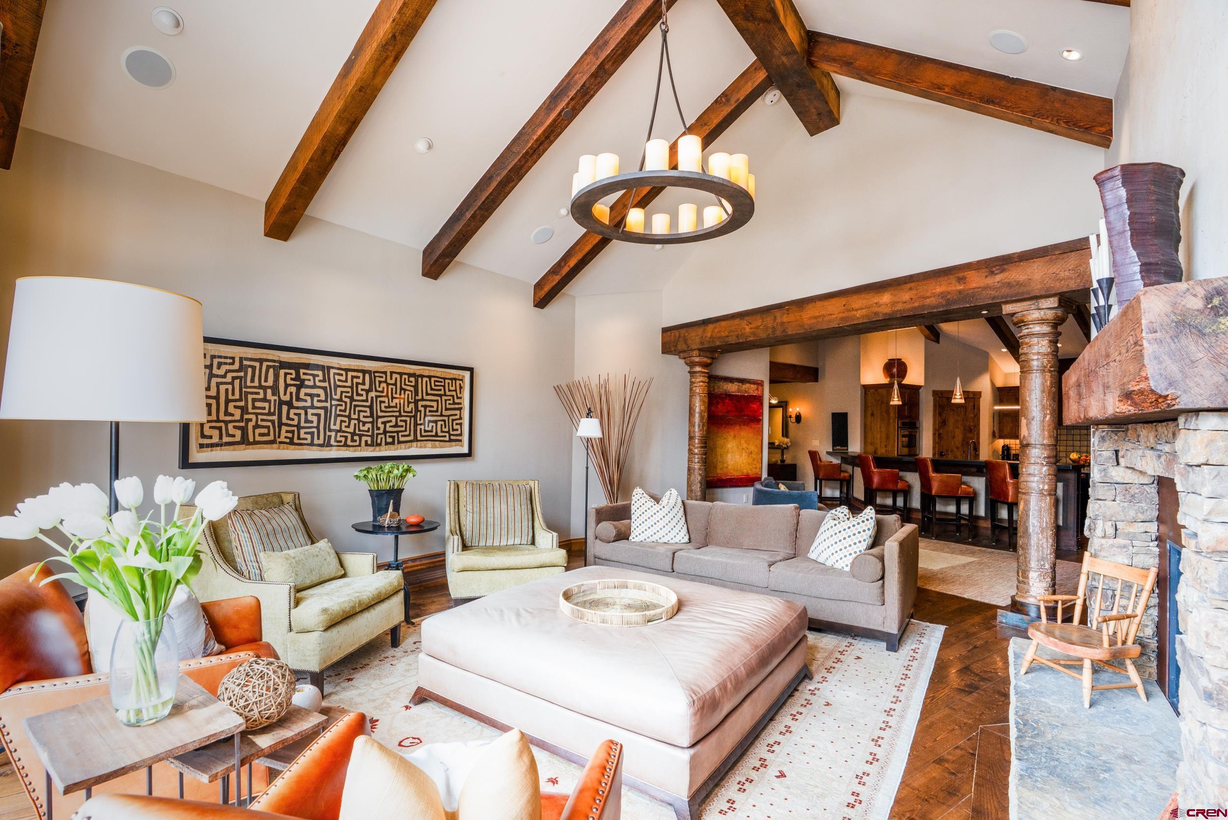 14 Hunter Hill Road, Unit A405 Crested Butte, CO 81225 - Photo 3 of 38 a living room with furniture and wooden floor