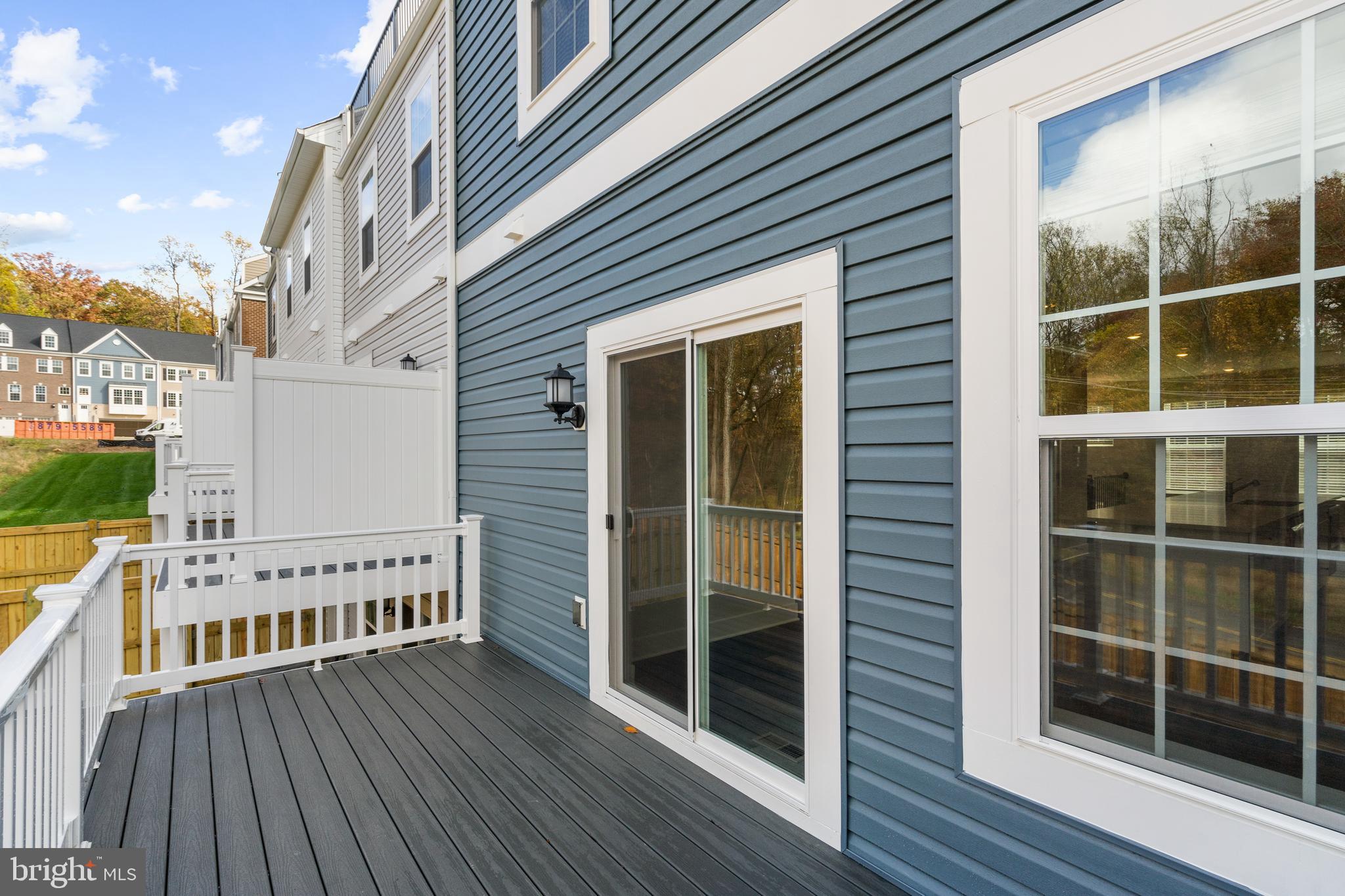 1730 Water Xing Road Baltimore, MD 21208 - Photo 4 of 5 a view of a balcony with wooden floor