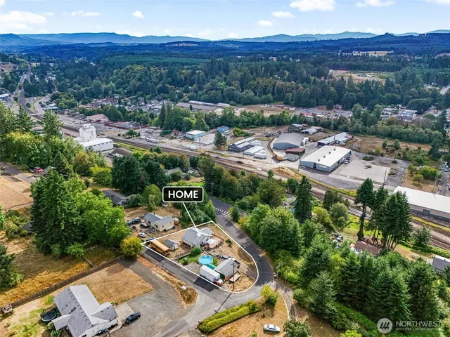 an aerial view of residential house with outdoor space