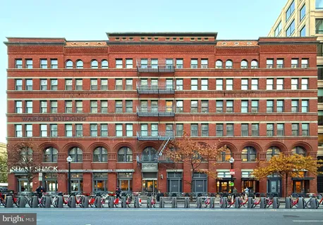 a front view of a building with balcony