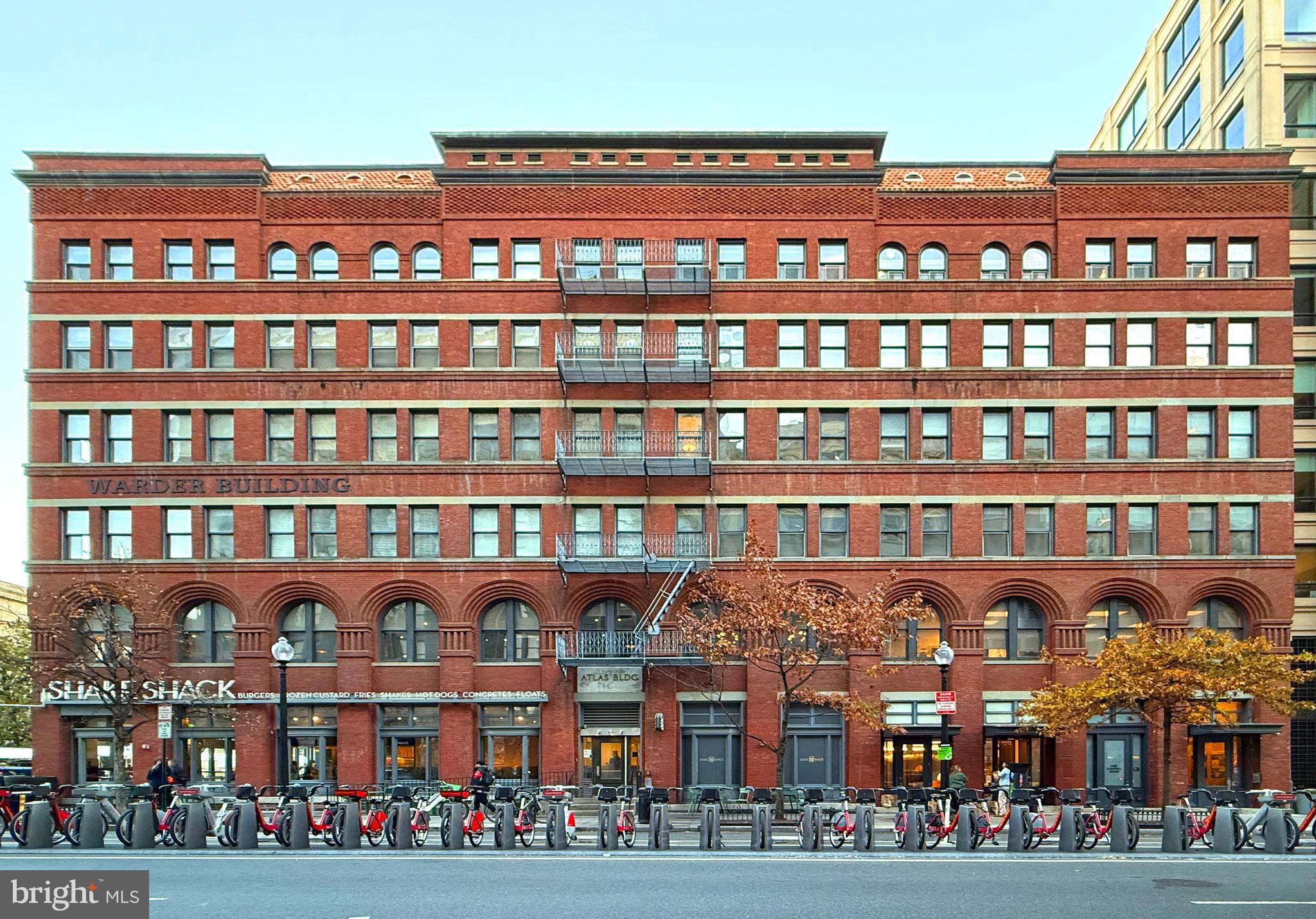 515 9th Street Northwest, Unit 3E Washington, DC 20004 - Photo 1 of 20 a front view of a building with balcony