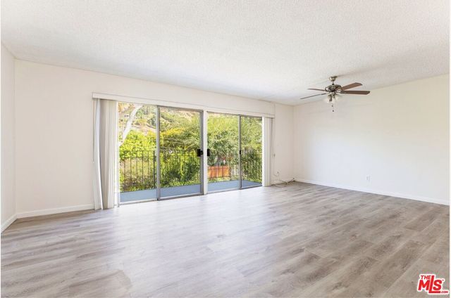 a view of a room with a window