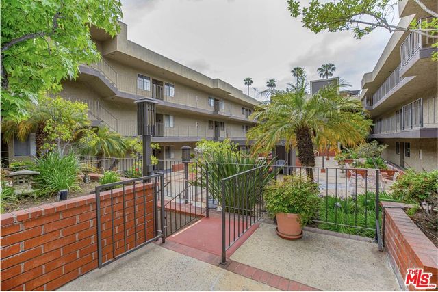 a house view with sitting space and garden space