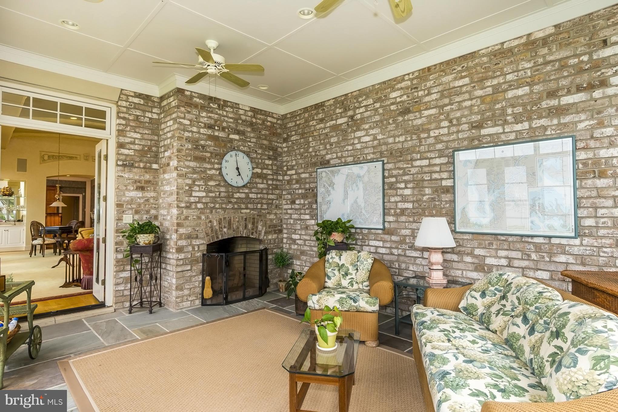 615 Blackbeard Road Queenstown, MD 21658 - Photo 9 of 30 Sun Room with Fireplace