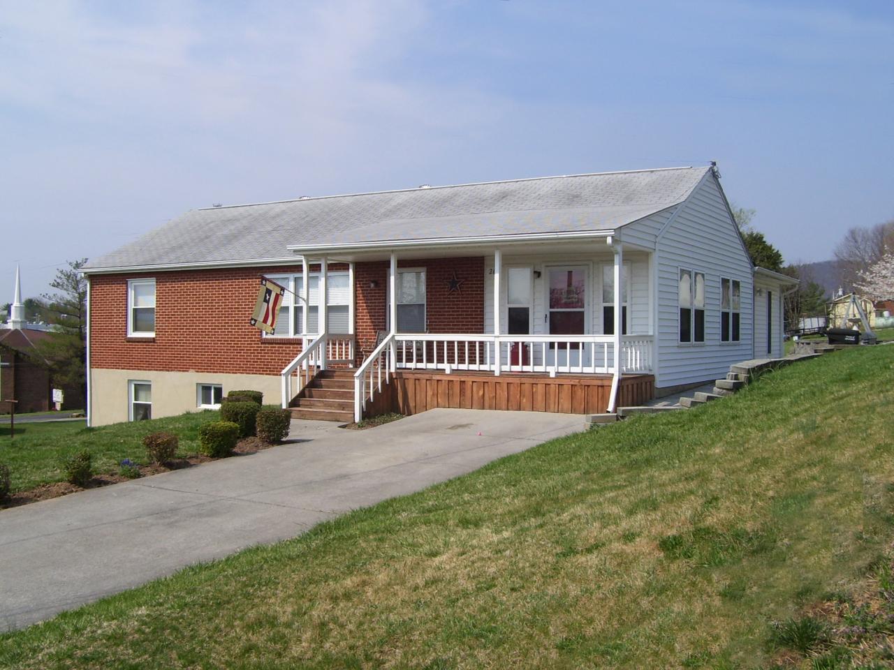 261 Post Road Roanoke, VA 24019 - Photo 1 of 6 a view of house with a big yard and potted plants
