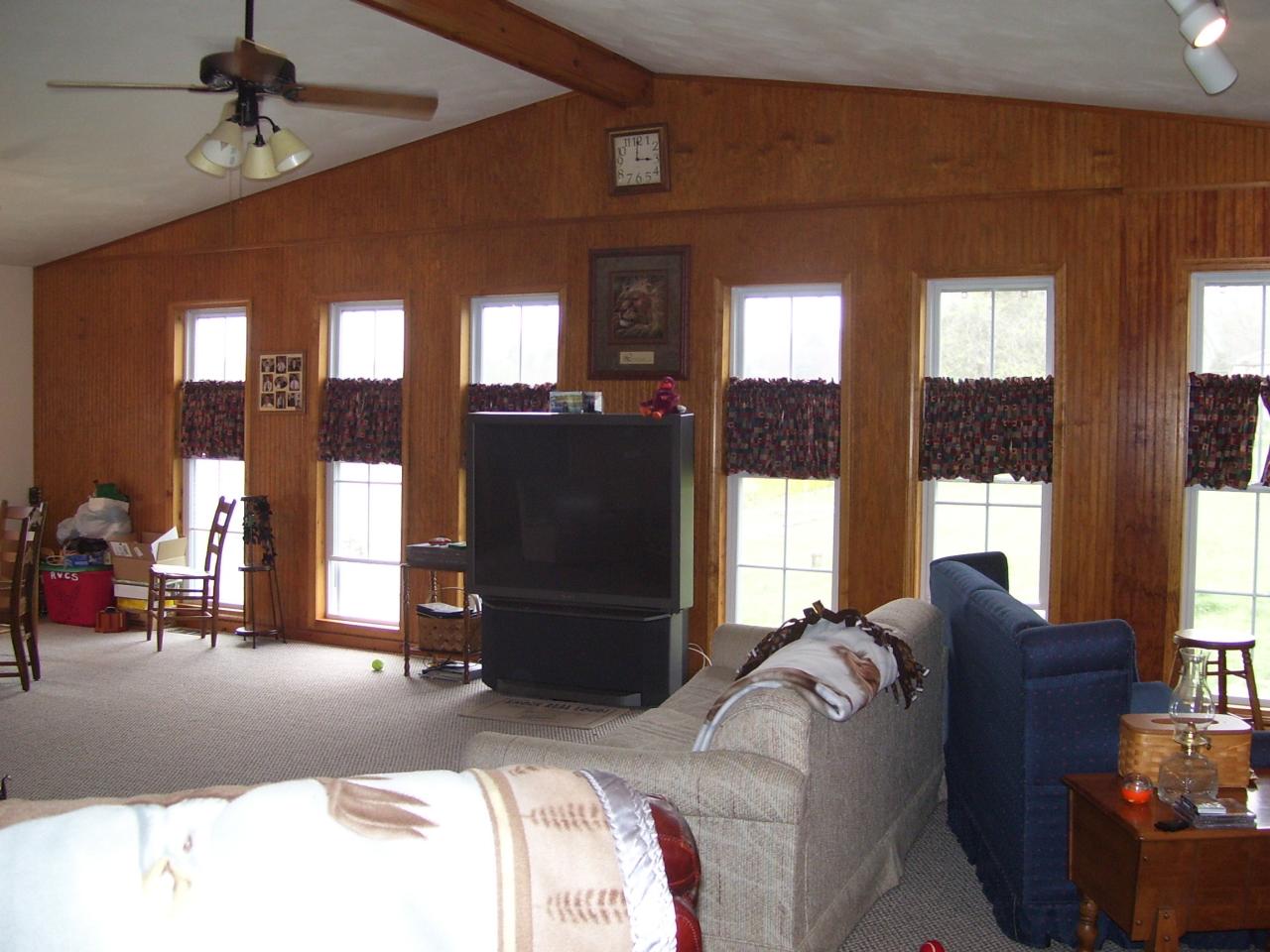 261 Post Road Roanoke, VA 24019 - Photo 3 of 6 a bed room with a bed and a chandelier