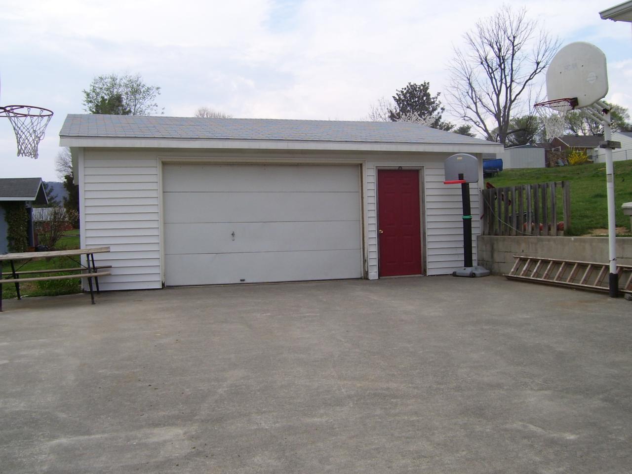 261 Post Road Roanoke, VA 24019 - Photo 5 of 6 a view of a house with a garage