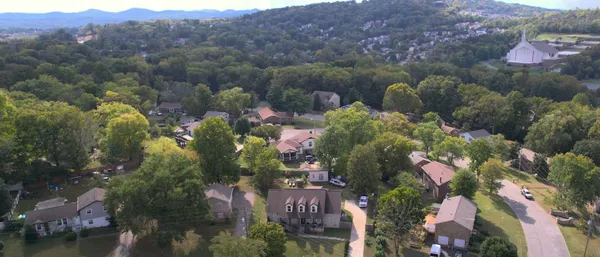 an aerial view of lake residential house and outdoor space