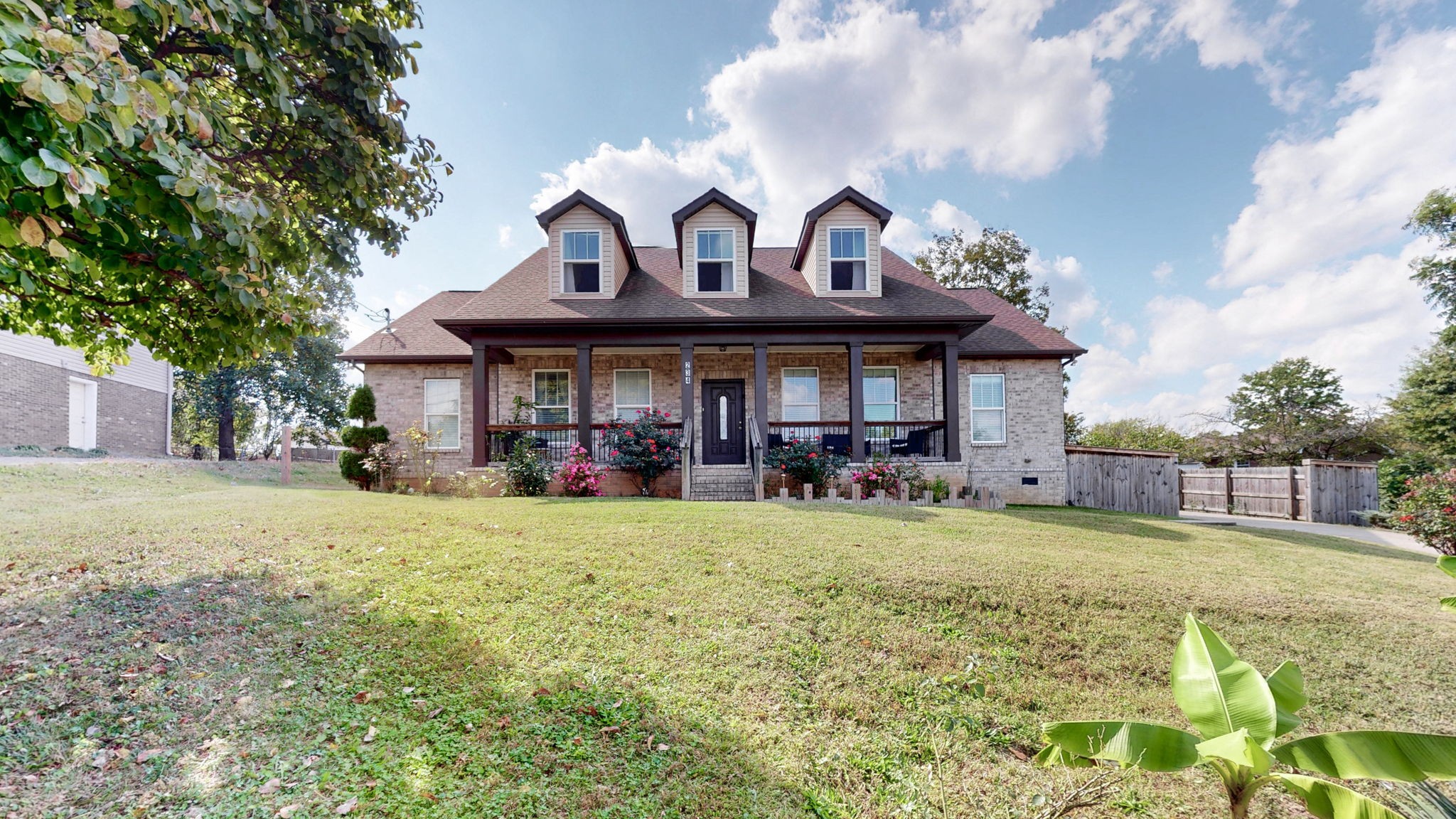 234 Cedarview Drive Antioch, TN 37013 - Photo 9 of 50 a view of a big house with table and chairs