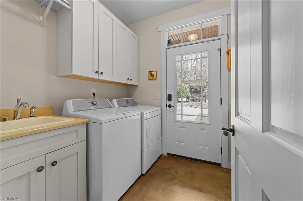 8804 Dapple Grey Road Oak Ridge, NC 27310 - Photo 17 of 48 Wonderful Laundry room with utility sink
