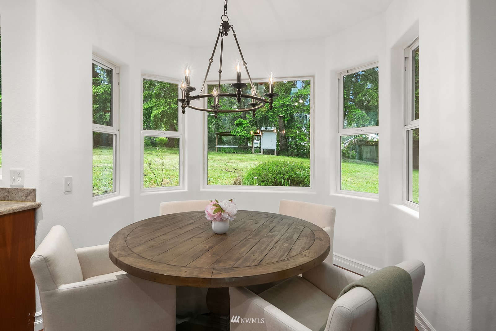 18512 Southeast Petrovitsky Road Renton, WA 98058 - Photo 17 of 40 a view of a dining room with furniture window and outside view