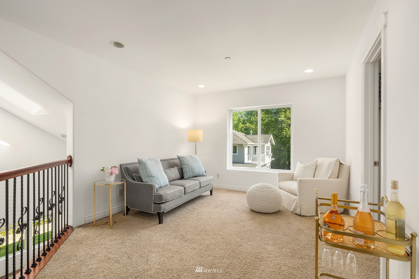 18512 Southeast Petrovitsky Road Renton, WA 98058 - Photo 23 of 40 a living room with furniture and a window