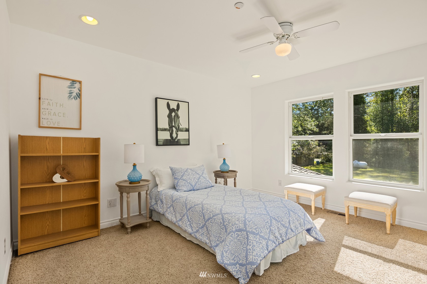 18512 Southeast Petrovitsky Road Renton, WA 98058 - Photo 27 of 40 a bedroom with a bed and a window