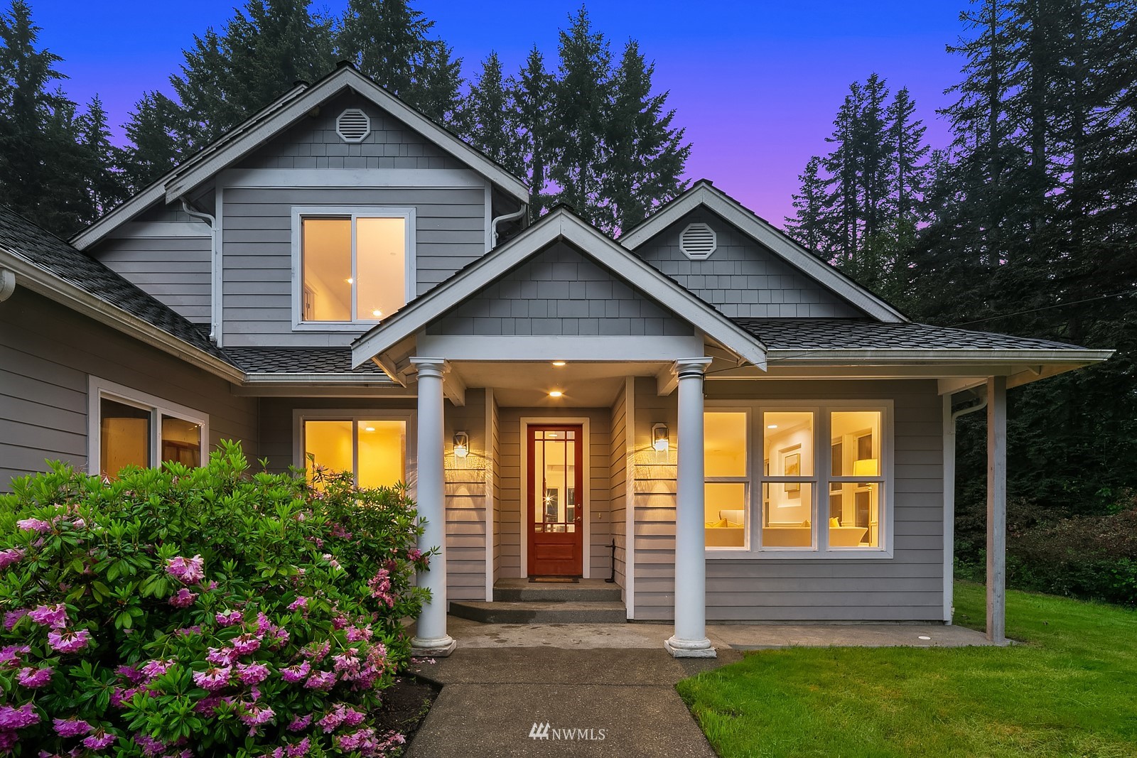 18512 Southeast Petrovitsky Road Renton, WA 98058 - Photo 34 of 40 a front view of a house with a yard