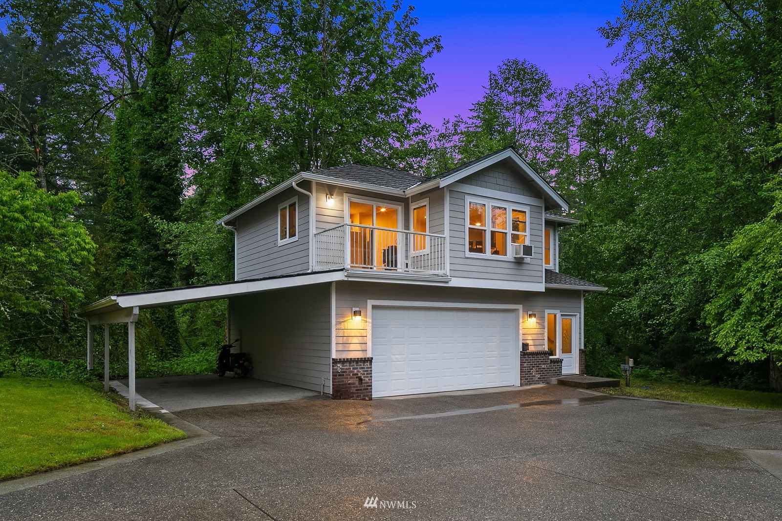 18512 Southeast Petrovitsky Road Renton, WA 98058 - Photo 35 of 40 a front view of a house with a garage