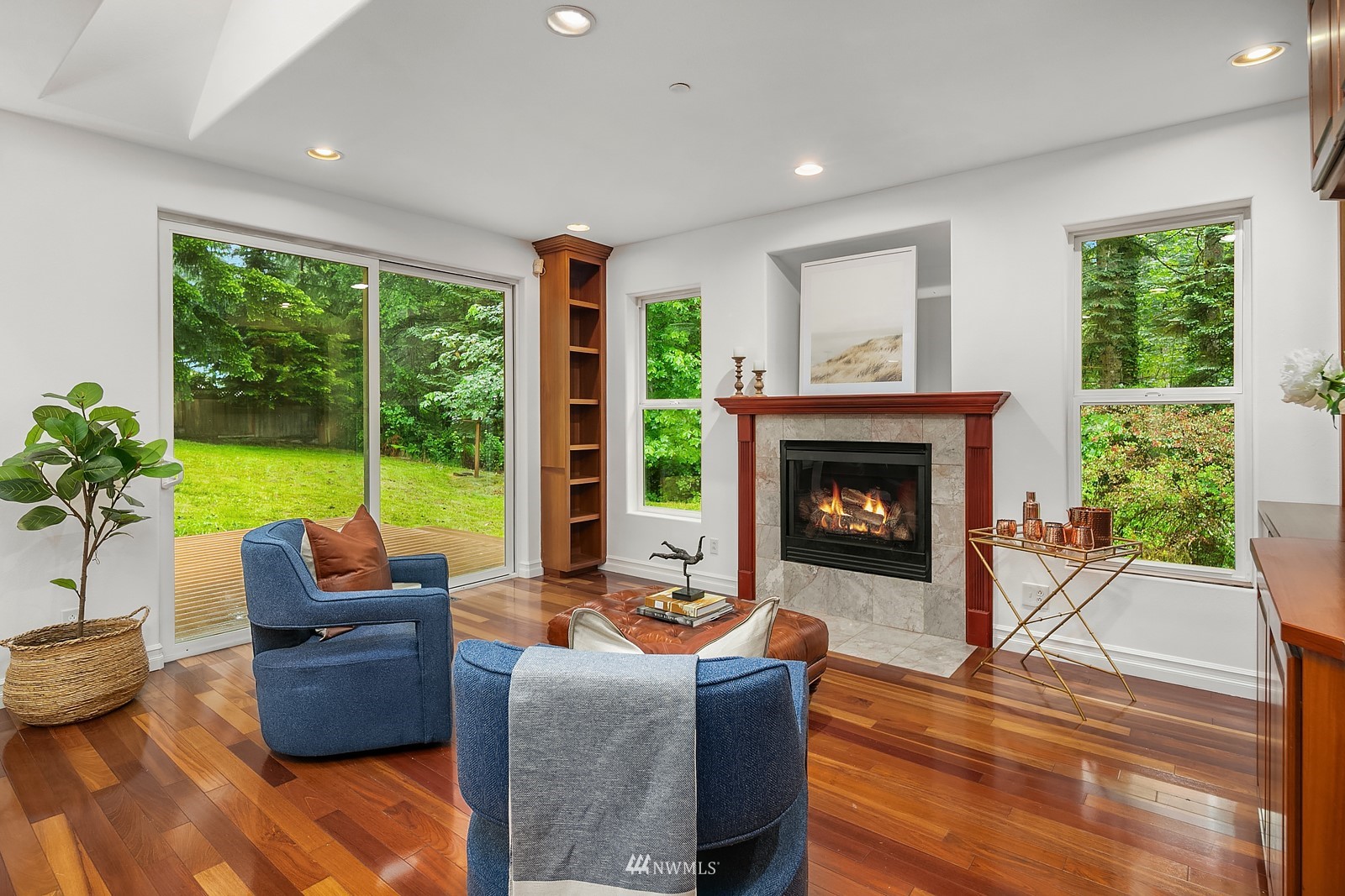 18512 Southeast Petrovitsky Road Renton, WA 98058 - Photo 7 of 40 a living room with furniture and a fireplace