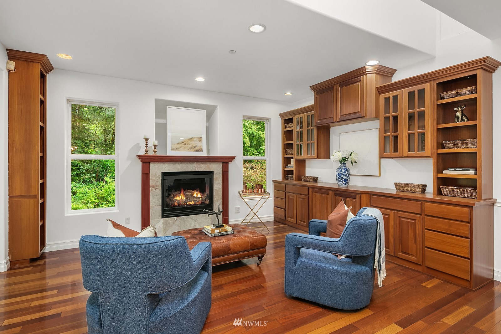 18512 Southeast Petrovitsky Road Renton, WA 98058 - Photo 8 of 40 a living room with furniture and a fireplace