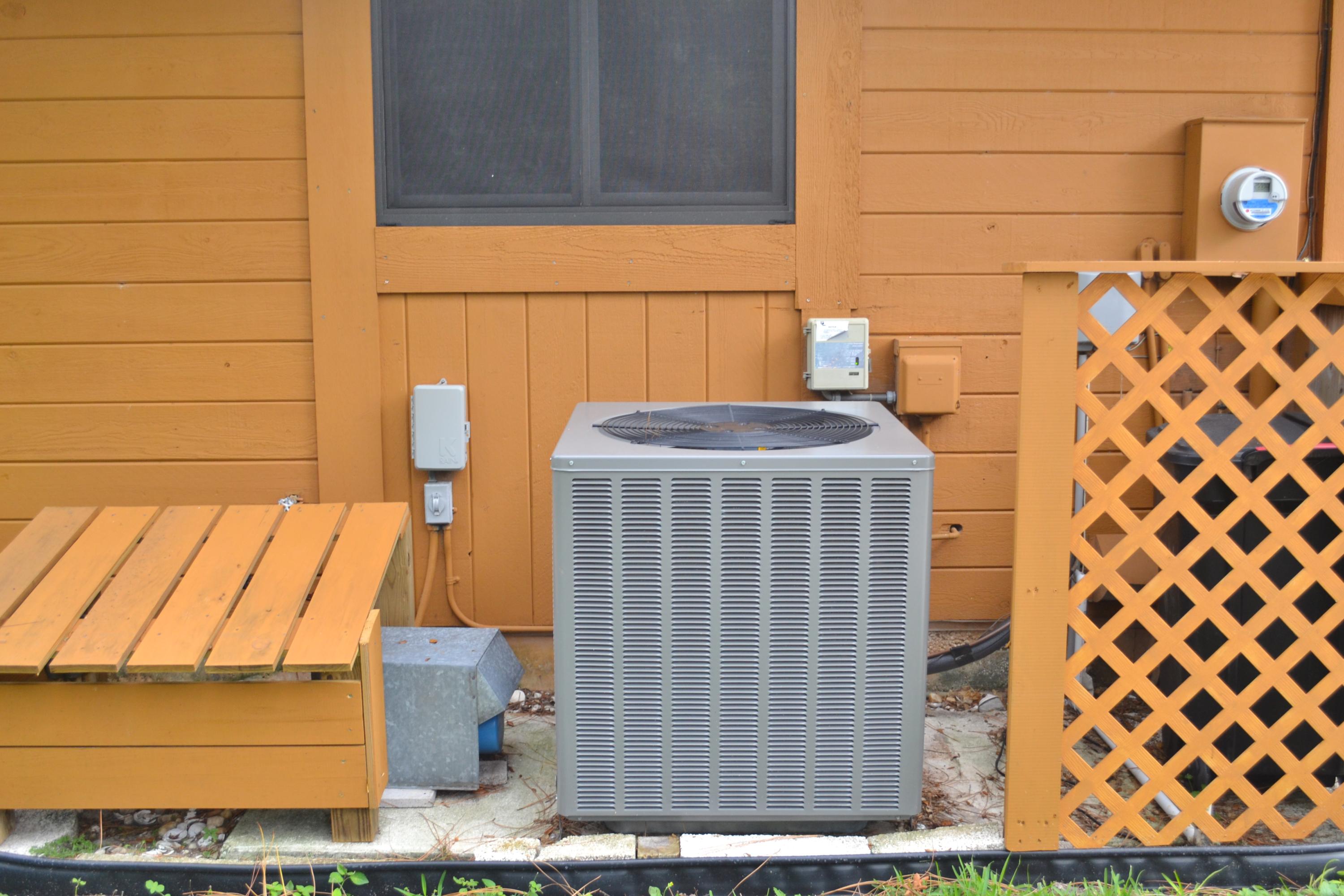 6063 Wood Lake Road Jupiter, FL 33458 - Photo 12 of 60 AIR CONDITIONER NEW IN 2013