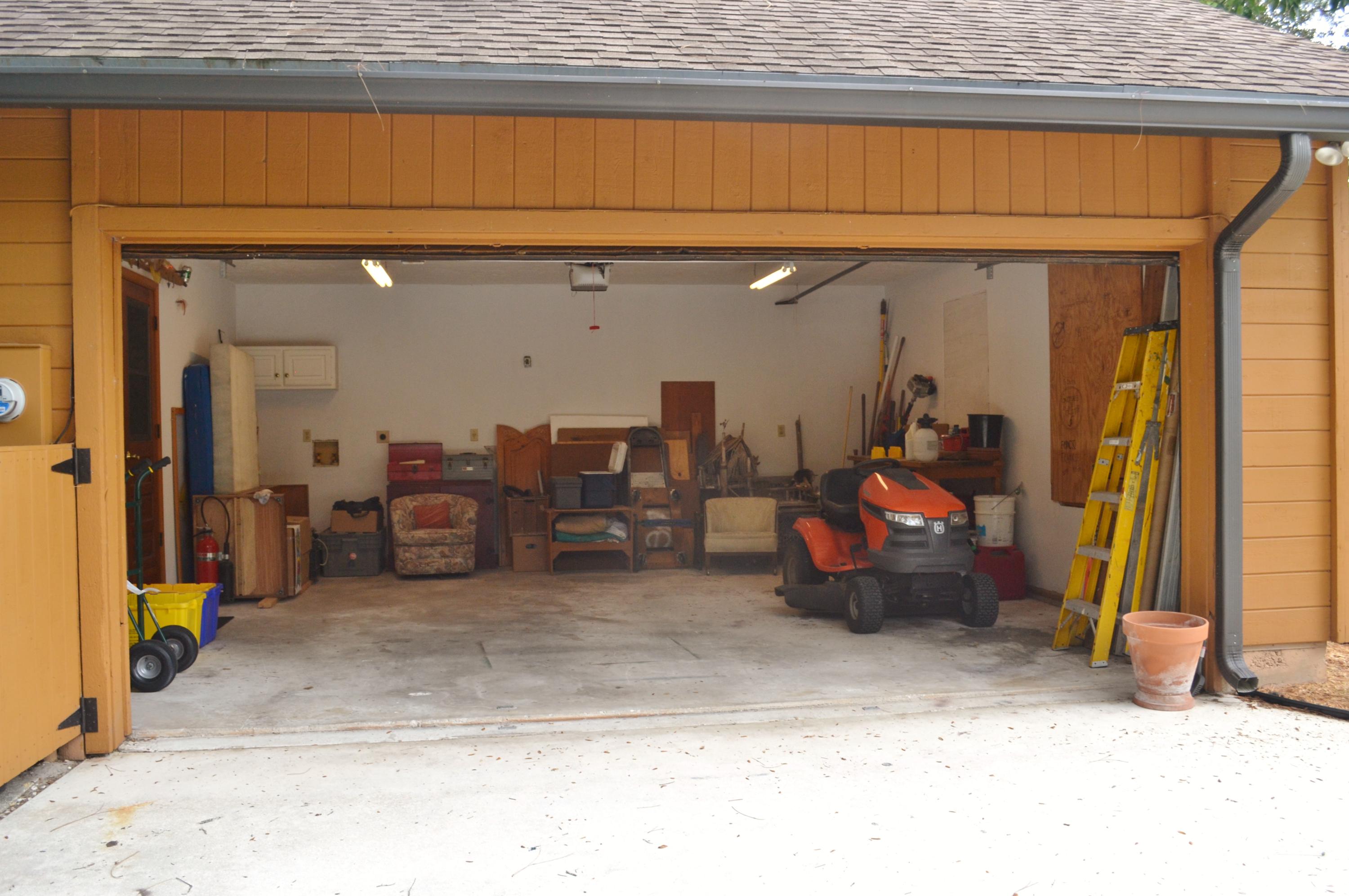 6063 Wood Lake Road Jupiter, FL 33458 - Photo 13 of 60 OPEN VIEW OF GARAGE FROM DRIVEWAY