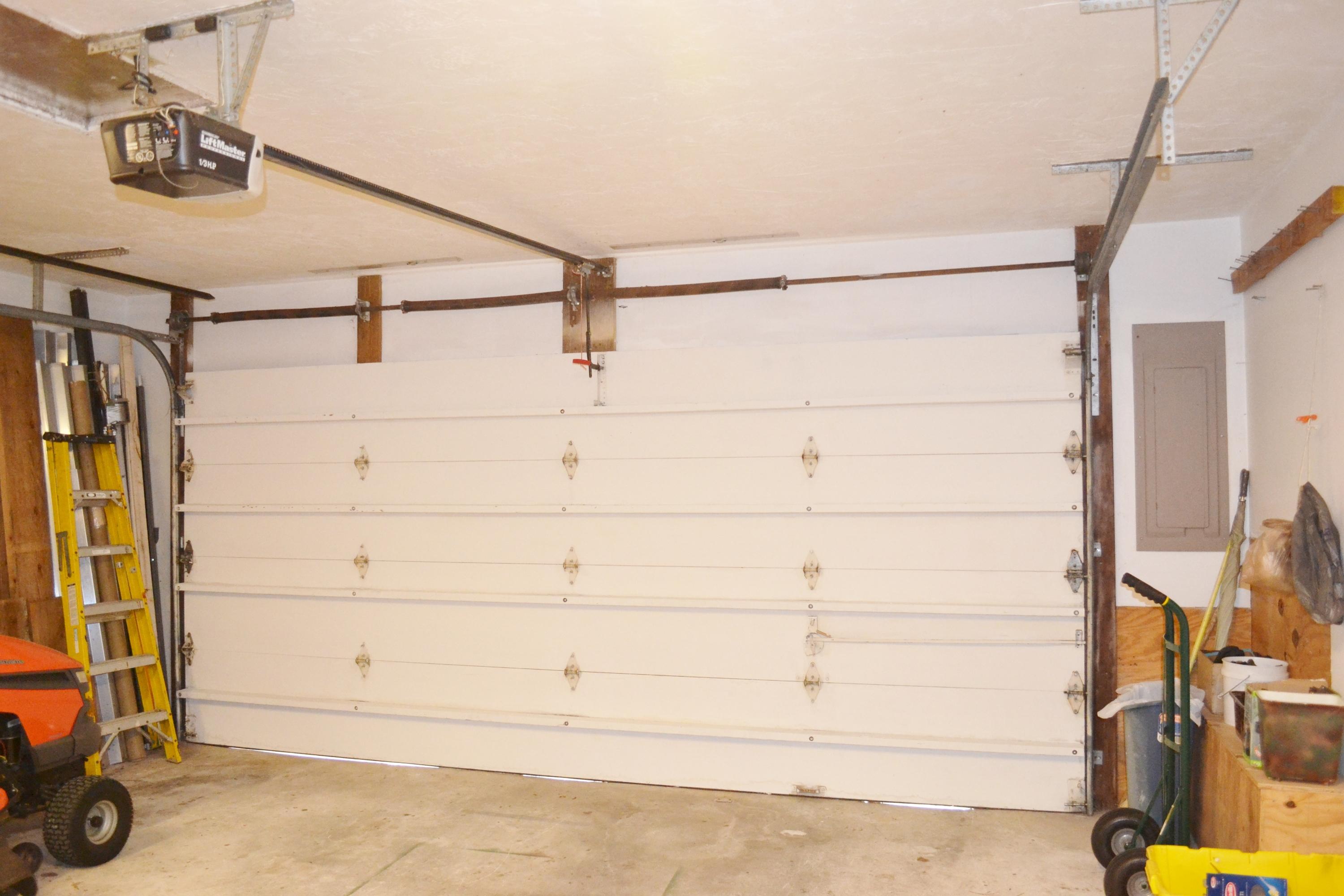 6063 Wood Lake Road Jupiter, FL 33458 - Photo 14 of 60 2 CAR GARAGE DOOR
