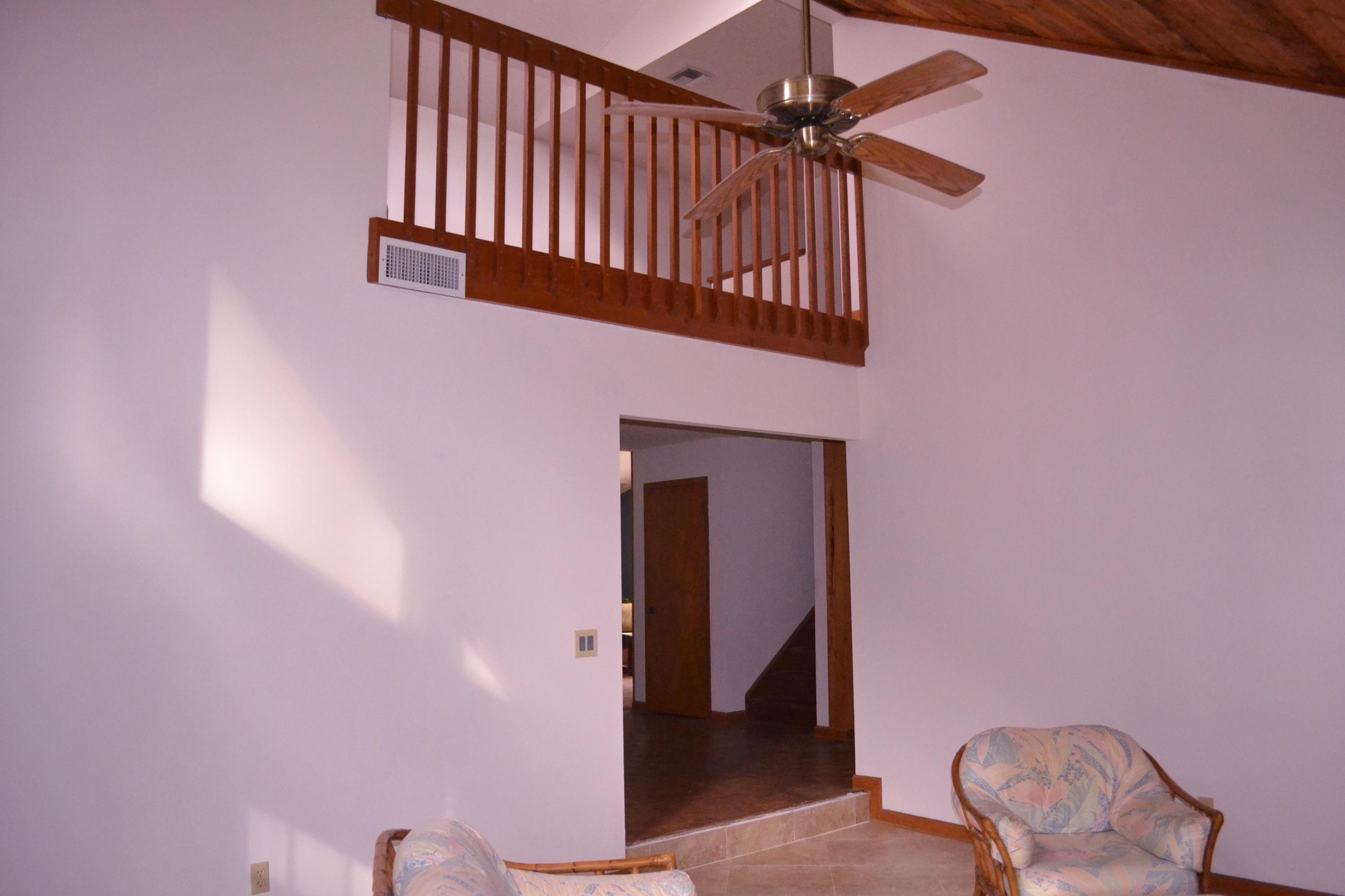 6063 Wood Lake Road Jupiter, FL 33458 - Photo 27 of 60 VAULTED CEILINGS IN LIVING DINING ROOM